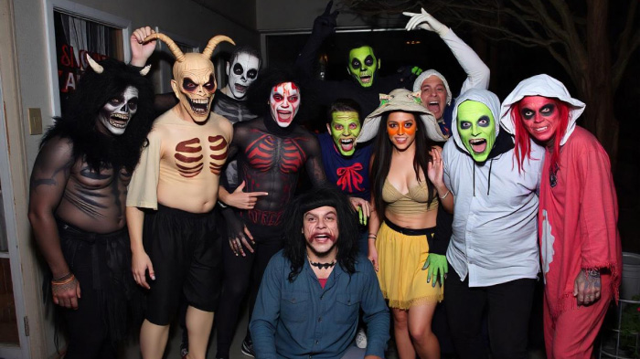 An image of the classic monster group photoshoot idea for Halloween, featuring people dressed as different monsters.