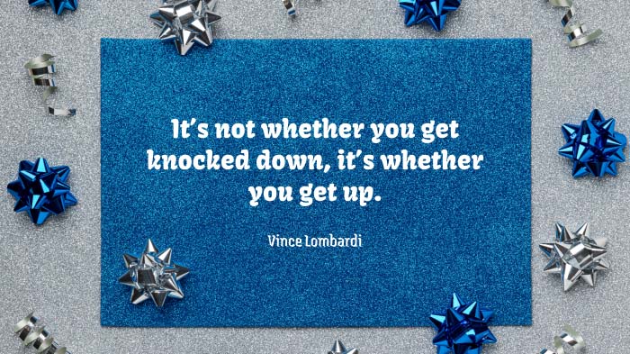 An image featuring blue and silver bows and a motivational quote by Vince Lombardi.