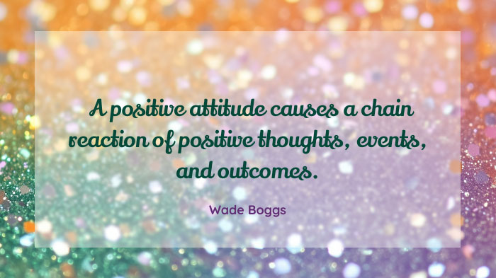 An image with a colorful glittery background and a positive quote by Wade Boggs.