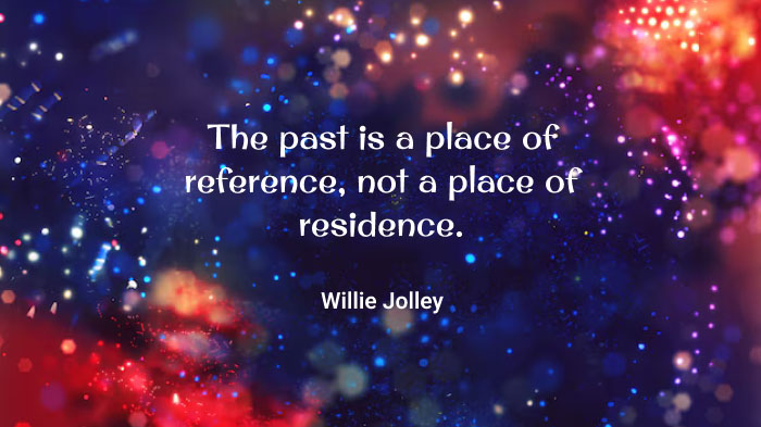  An image with a read and blue bokeh effect background and a quote about the past by Willie Jolley.